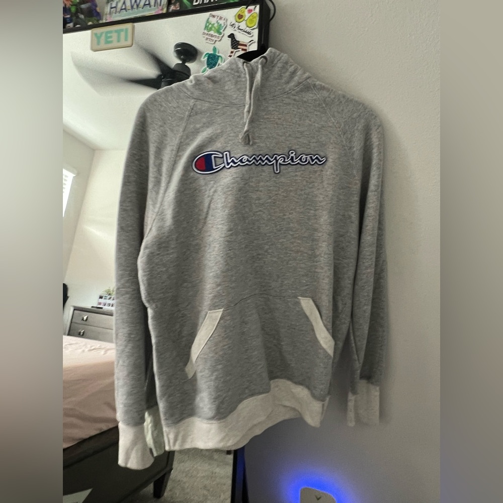 Champion hoodie, size small. Could be a men’s hoodie or a women’s.